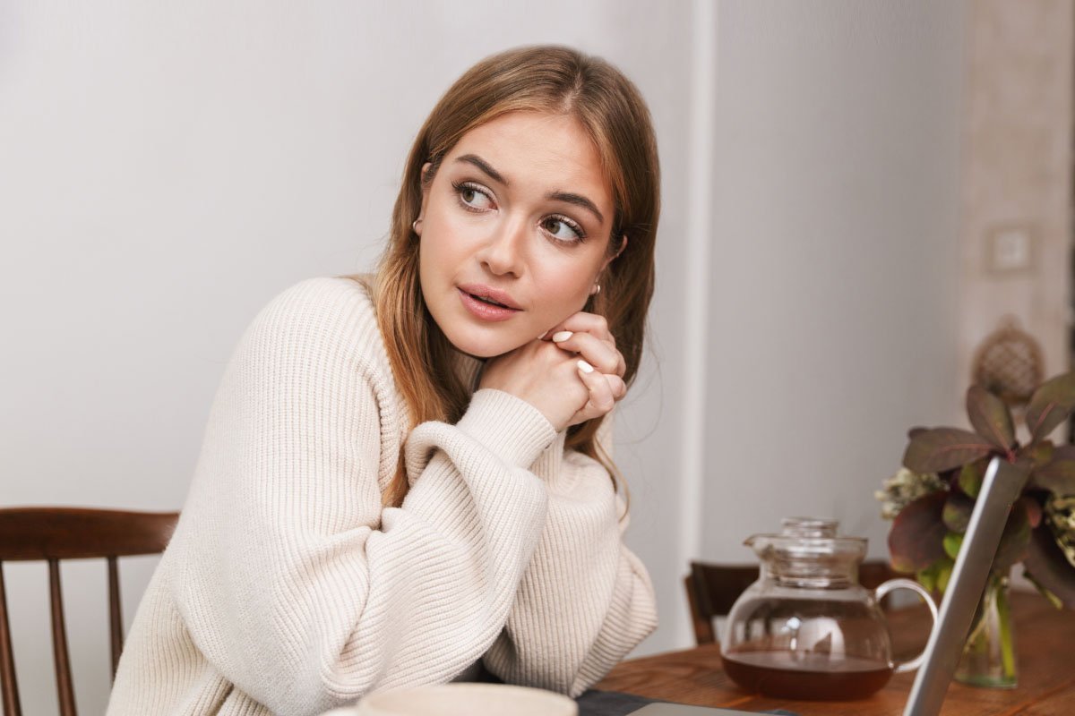 contemplative-young-woman-in-soft-purplish-hue